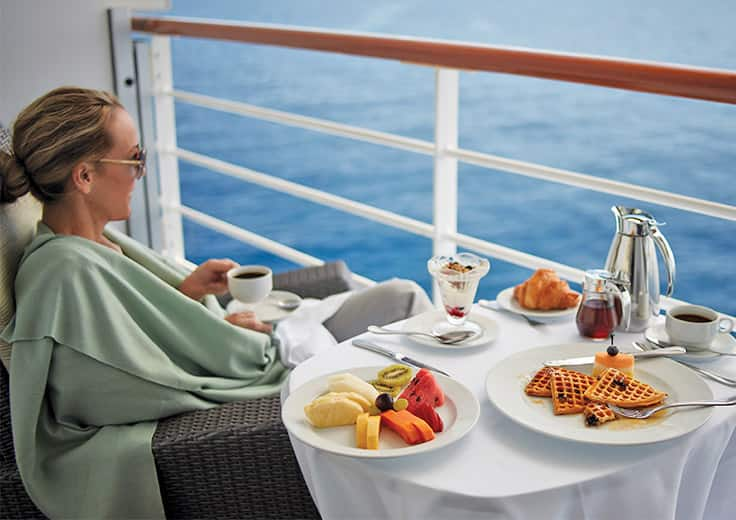 Lady enjoying ocean view on board Marina