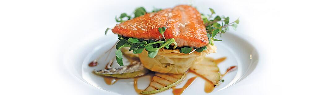 Enjoying a salmon dinner on board Marina